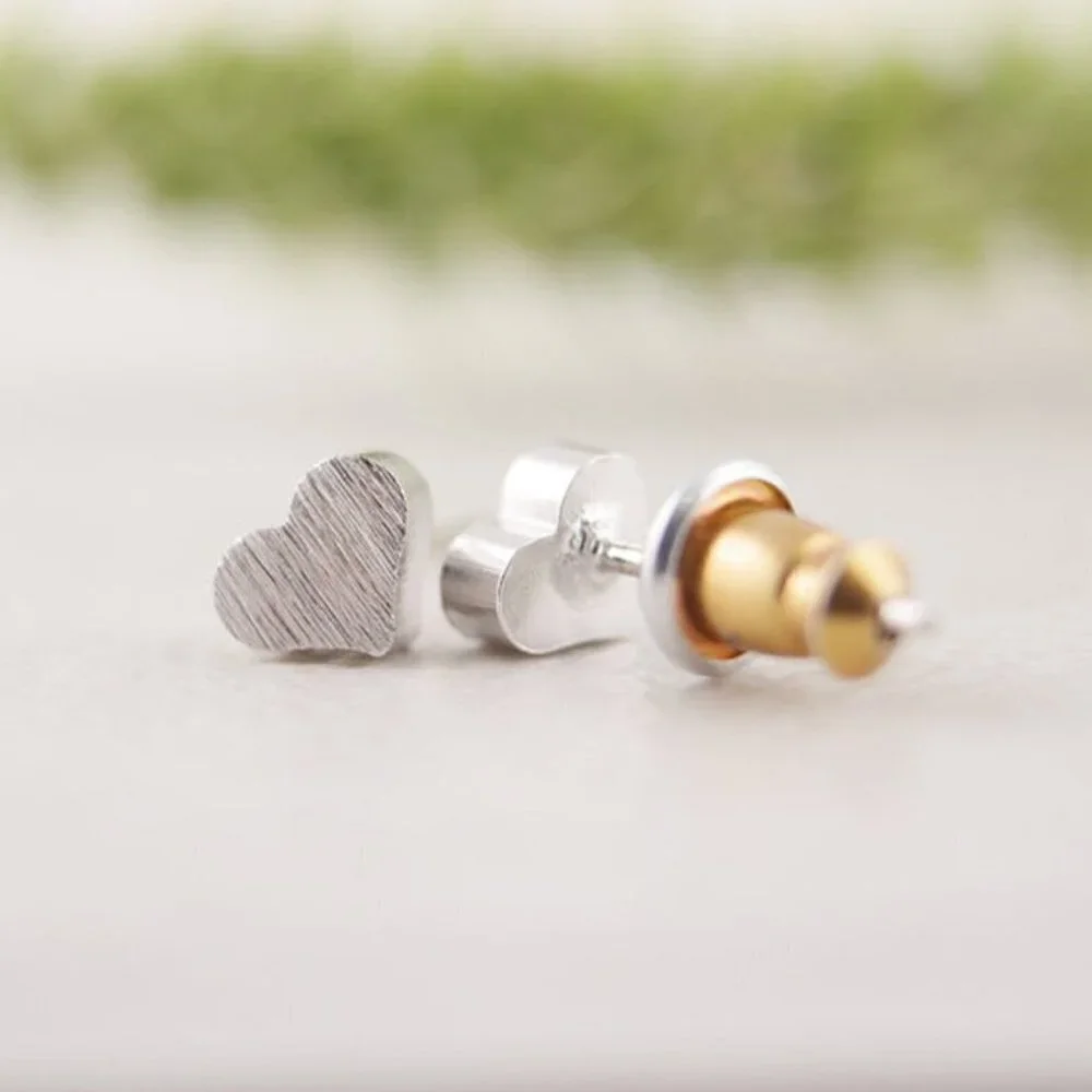 Jewelry earrings stud studs heart love romantic dainty minimalist silver tone